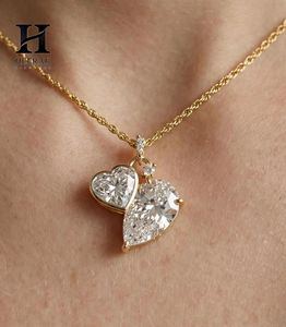 Collier élégant avec pendentif en forme de cœur et diamant taillé en poire en or massif – Bijoux fins par Heerak Diamonds - Product Image 1