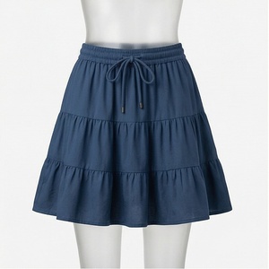 Jupe courte à taille élastique pour femmes, couleur unie, volants, style décontracté, 100% polyester, à porter en toutes saisons - Product Image 1