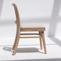 Chaise de salle à manger en rotin et bois Vandana Falcon Altis pour une assise confortable et élégante dans les maisons modernes