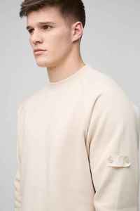 เสื้อสเวตเชิ้ตคอกลมสีครีมสำหรับผู้ชาย แขนเสื้อแบบแร็กแลน ทรงปกติ สีพื้นเรียบง่าย สวมใส่สบายในฤดูใบไม้ร่วง ผ้าถักเฟรนช์เทอร์รี่ - Product Image 2