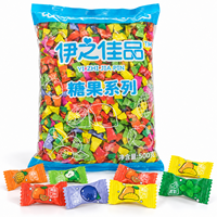 Assortiment de bonbons dans des emballages individuels colorés pour les boutiques de détail et les tables de bonbons de mariage
