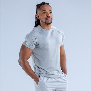 Camisetas de Gimnasio para Hombre con Logotipo Frontal Personalizado al por Mayor, Ropa Deportiva Transpirable de Secado Rápido, Camisetas de Running con Dobladillo Curvo de Alta Elasticidad OEM - Product Image 2