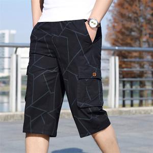 Pantalones Cortos Cargo con Estampado Geométrico para Hombre, Cintura Elástica Negra, Múltiples Bolsillos, Estilo Casual, Secado Rápido, Tela de Poliéster - Product Image 2