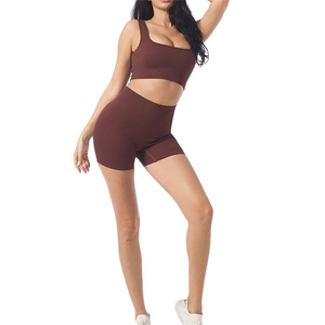 Conjunto de yoga sexy de color liso para gimnasio, leggings ajustados, top deportivo con espalda cruzada, 2 piezas, traje deportivo suave con tirantes para mujer - Product Image 1