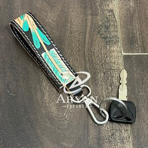 พวงกุญแจหนังวัวแท้สลักลายด้วยมือแบบสั่งทำใหม่ล่าสุด พร้อมตัวล็อคโลหะ เหมาะสำหรับเป็นของขวัญ - Product Image 1