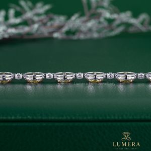 Refined Fancy Yellow Lab Grown Diamond Tennis Bracelet Featuring Oval Stones With White Diamond Halo <b>Frames</b> And Prong Settings - Product Image 4