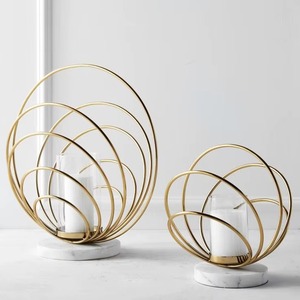 <b>Decorative</b> metal candle stand with marble base modern design for stylish interior enhancement - Product Image 1