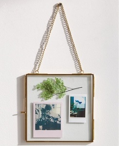 Elegant Metal And Glass Photo <b>Frame</b> with <b>Gold</b> Metal Finish for Wall Decoration and Family Photo Display - Product Image 1