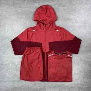 Ensemble survêtement homme tendance : veste coupe-vent en polyester et short, design personnalisé, fermeture éclair intégrale, en nylon - Product Image 1