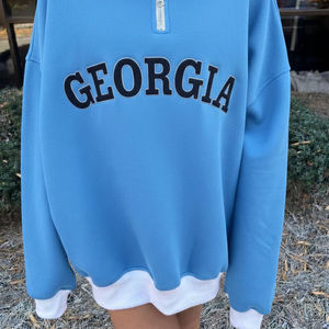 เสื้อสเวตเชิ้ตคอกลมแบบซิปสองสี ผ้าฟลีซ แขนยาวทรงโอเวอร์ไซส์ สีพื้น คุณภาพพรีเมียม สำหรับฤดูหนาว พร้อมป้ายโลโก้ด้านหน้า สามารถปรับแต่งได้ - Product Image 1