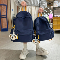 Sac à dos jaune de grande capacité en nylon avec fermeture éclair, antivol, décontracté, pour l'école, les voyages, unisexe, plusieurs poches, sac quotidien pour étudiants