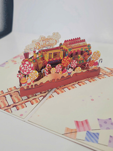 Tarjeta de Cumpleaños Pop-Up con Escena de Tren de Dulces en 3D, Impresión Digital, Papel con Laminado Brillante, Forma Irregular, Tarjeta de Regalo - Product Image 3