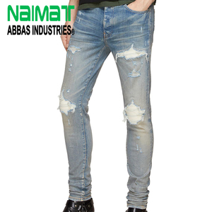 Jean en denim déchiré bleu clair premium pour homme, coupe skinny, en coton doux et extensible, style motard, coupe ajustée, pantalon décontracté et tendance - Product Image 1