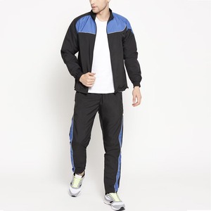 Conjunto Deportivo Personalizado para Hombre en Negro y Azul con Bloques de Color, Chaqueta con Cierre Completo y Pantalones de Poliéster y Algodón para Correr y Hacer Ejercicio - Product Image 5