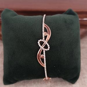 Bracelet Revalia en argent sterling 925 plaqué or rose avec breloque nœud infini et diamant, finition rhodium, élégant cadeau pour femme - Product Image 2