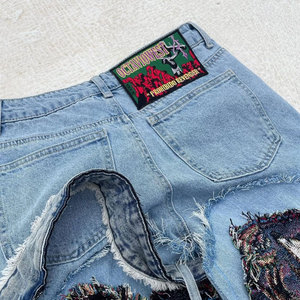 Pantalon homme déchiré et plissé avec broderie, poches latérales à boutons, style empilé, vente en gros - Product Image 6