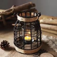Fabricant en gros vintage en fer forgé nordique portable bougie lanterne chandelier pour la décoration de la maison pour Noël