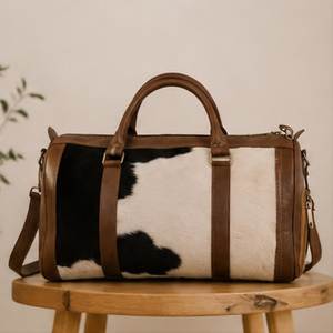Bolsa de Viaje de Cuero Vacuno Auténtico, Diseño Marrón y Blanco, Ecológica, Gran Capacidad, Duradera, Ligera, Premium, Casual - Product Image 1