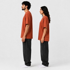 T-shirt unisexe en coton orange rouille, coupe oversize avec épaules tombantes, col rond, manches courtes et coupe décontractée pour un style streetwear décontracté - Product Image 6