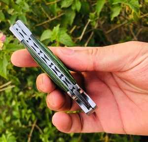Cuchillo Plegable de Acero de Damasco Hecho a Mano OEM con Empuñaduras Grabadas en Acero, Cuchillo de Bolsillo Plegable para Exteriores de Acero de Damasco Hecho a Mano - Product Image 4