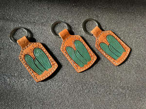 ห่วงโซ่กุญแจหนังที่แกะสลักด้วยมือรูปทรงแปลกใหม่น่ารักอุปกรณ์เสริมพวงกุญแจหนังสำหรับทุกเพศ - Product Image 3