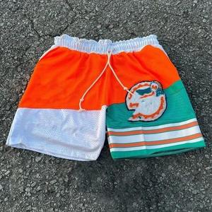 Vente en gros de shorts de course de gym respirants à taille élastique et à séchage rapide pour hommes, style décontracté, patchs solides en maille ample. - Product Image 1