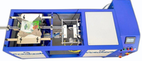 Système d'assemblage et de scellage robotisé à double voie pour Doypack, ultra-flexible, à mouvement continu, pour l'emballage sécurisé de sachets préformés à fermeture éclair