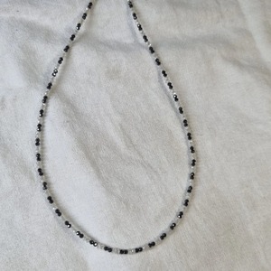 ลูกปัดมอยส์ซาไนต์สีดำและสีขาวนวล ขนาด 2.50 มม. เจียระไนเกรด AAA (16 นิ้ว) - Product Image 3