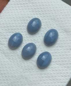 โอปอลสีน้ำเงินธรรมชาติทรงรีหลังแบน คุณภาพสูง ขัดเงา สำหรับทำเครื่องประดับ ขายส่ง - Product Image 2