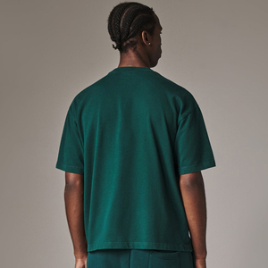 T-shirt en coton uni surdimensionné pour homme, col rond, manches courtes, couleur unie, coupe décontractée à épaules tombantes, vente en gros - Product Image 4