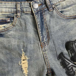 กางเกงยีนส์ผู้ชายขายดีปี 2026 แฟชั่นสตรีทลายดาว กางเกงยีนส์วินเทจสไตล์ฮิปฮอปพังก์สำหรับผู้ชาย - Product Image 4