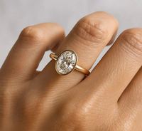 Bague de fiançailles et de mariage vintage en moissanite taille ovale, sertie à deux griffes et à sertissage clos, en argent sterling 925 plaqué, de luxe, de marque tierce