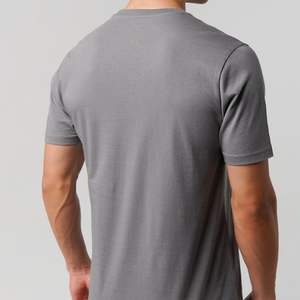 เสื้อยืดคอกลมโอเวอร์ไซส์แขนสั้นพิมพ์ลายดิจิตอลผ้าฝ้าย 100% สำหรับผู้ชาย พิมพ์ลายตัวอักษรโลโก้ด้านหน้า ป้องกันรังสียูวี ระบายอากาศได้ดี เป็นมิตรกับสิ่งแวดล้อม - Product Image 5