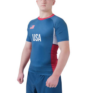 Rashguard MMA unisexe personnalisé à manches courtes 220 GSM 100% polyester séchage rapide compression fabricant OEM UPF50 respirant - Product Image 5