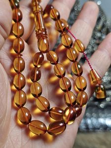 Chapelet religieux rond en ambre fait main pour la prière et la méditation - Product Image 2