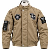 Blouson Bomber Homme Col Montant Beige avec Patch Logo Lettres Coupe-Vent Imperméable Décontracté Hiver Style Urbain