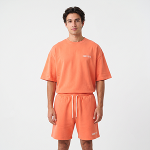 Conjunto deportivo de 2 piezas para hombre, camiseta de manga corta y pantalones cortos, color sólido, informal, holgado, para verano. - Product Image 1