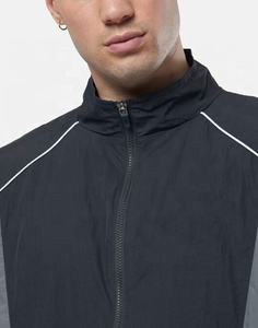 ชุดวอร์มลำลองแบบยูนิเซ็กซ์ ผ้าไนลอนกันลม แบบซิป 2 ชิ้น แขนและขาจั๊มพ์ยางยืด ระบายอากาศได้ดี - Product Image 4