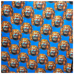 Tissu satiné Isogou bleu royal avec imprimé lion audacieux pour robes de mariée, tenues traditionnelles pour filles et mode africaine - Product Image 5
