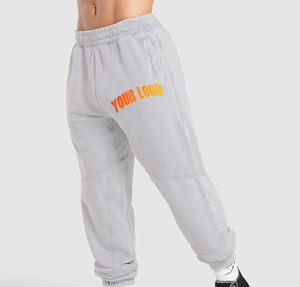 Pantalon de jogging vintage gris en coton pour homme, coupe droite, taille élastique, poches, respirant, logo imprimé sur la jambe droite, idéal pour l'automne - Product Image 1
