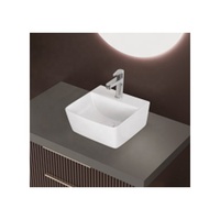 Lavabo à poser rectangulaire au design moderne en céramique à surface solide et émaillée lisse pour salle de bain, maison, bureau, villa
