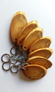 พวงกุญแจไม้รักษ์โลก ทำจากไม้ไผ่ธรรมชาติ สั่งทำโลโก้ได้ พวงกุญแจไม้แบบยั่งยืน ทำด้วยมือ ของขวัญรักษ์โลกจากผู้ผลิต - Product Image 2