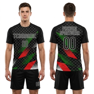 Uniforme de volley-ball personnalisé en polyester noir et vert avec des accents graphiques diagonaux rouges et des shorts noirs - Product Image 1
