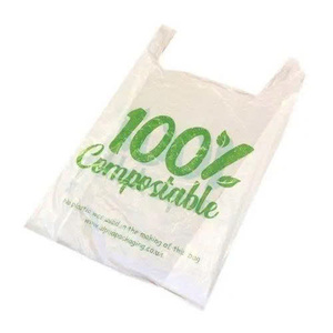 100% <b>Compostable</b> T-Shirt <b>Bag</b> with Green Print for Business & Shopping Use - Product Image 1