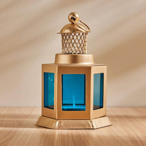 Vintage Gold Metal Glass Lantern Decorative <b>Candle</b> Holder with <b>Blue</b> Glass Panels and Geometric Design Hanging Handle Tabletop - Product Image 1