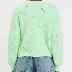 Suéter de punto holgado con cuello en V y botones, estilo urbano, transpirable, con patchwork, para mujer, estilo hip hop, moda urbana, tipo sudadera con capucha. - Product Image 6