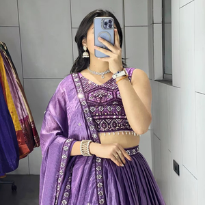 Ensemble Lehenga plissé tendance Fendy avec pompons faits main et chemisier luxueux orné de perles - Product Image 1