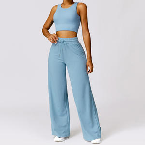 Ensemble de yoga deux pièces : Crop top sans manches dos nageur et pantalon taille haute à jambes larges, couleur unie, respirant, taille élastique torsadée - Product Image 5