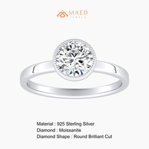 แหวนหมั้นมอยซาไนต์ทรงเม็ดประดับขอบเงินแบบฝังเพชรจาก Maed Jewels สำหรับผู้หญิง เครื่องประดับเจ้าสาวสไตล์มินิมอลสุดหรู สำหรับงานฉลองครบรอบ - Product Image 6