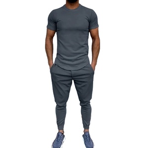 Conjunto de dos piezas de fitness de verano Camiseta de cuello redondo de color sólido y pantalones de jogging Simply Fit Active Bottoms Top y pantalones - Product Image 3